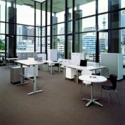 Office furniture in a modern open plan area
